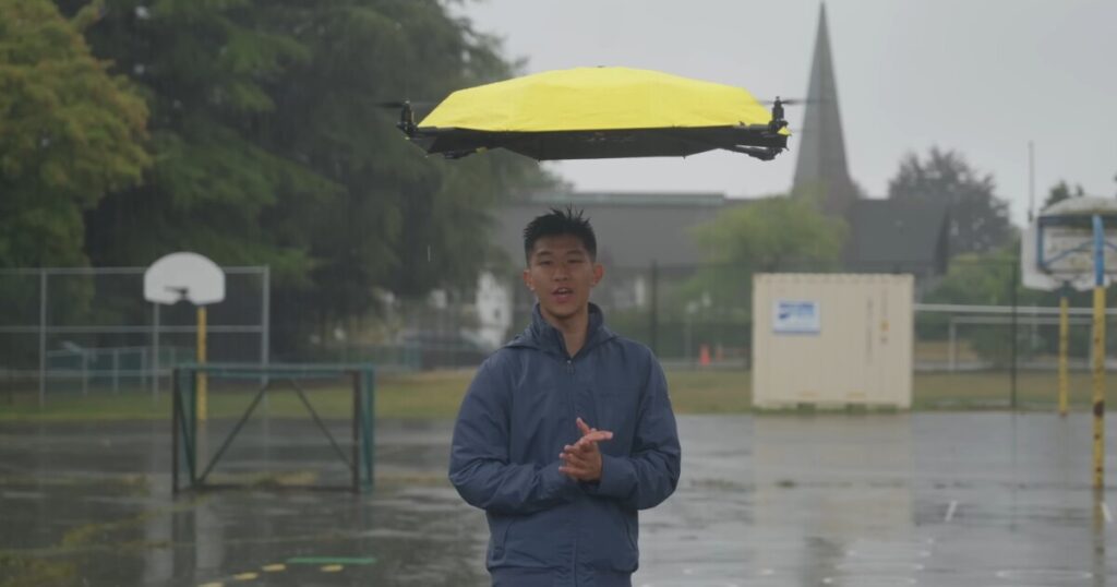 Hands free flying umbrella follows you in the rain