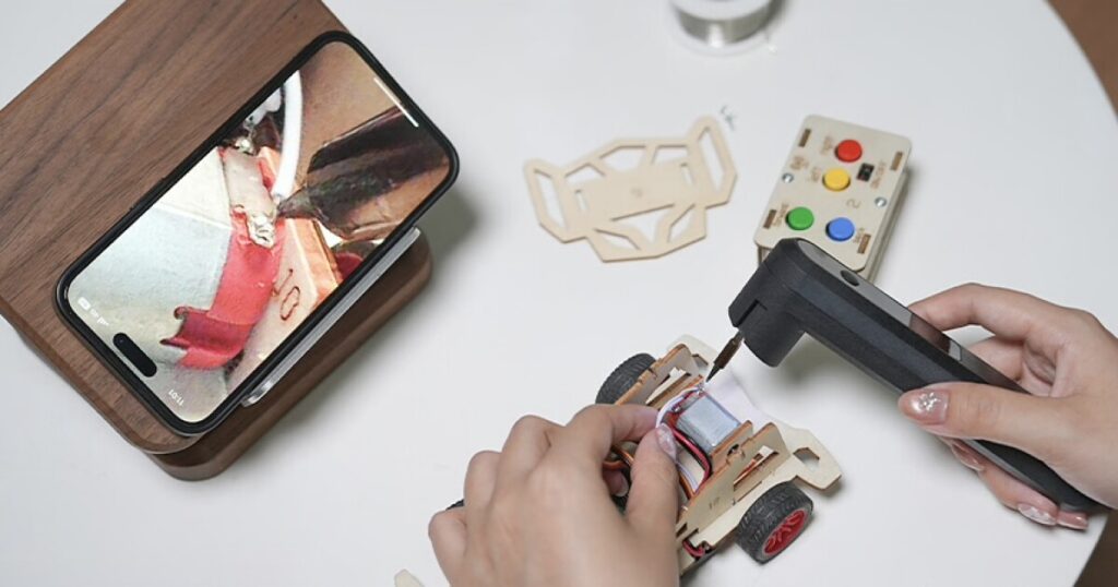 Smart soldering iron with camera aids visibility