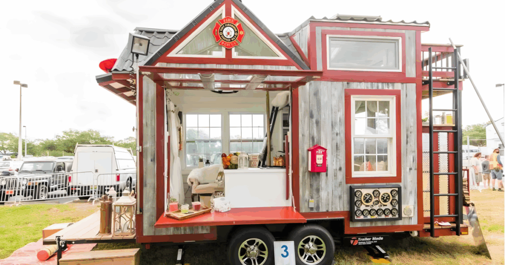 Firehouse-inspired tiny house includes rooftop deck and working fire pole