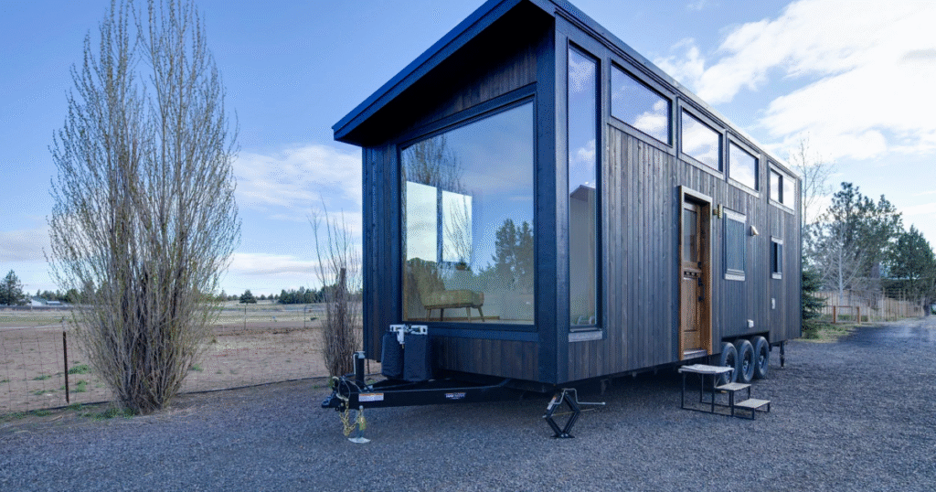Storage-packed tiny house boasts spacious layout with a freestanding tub